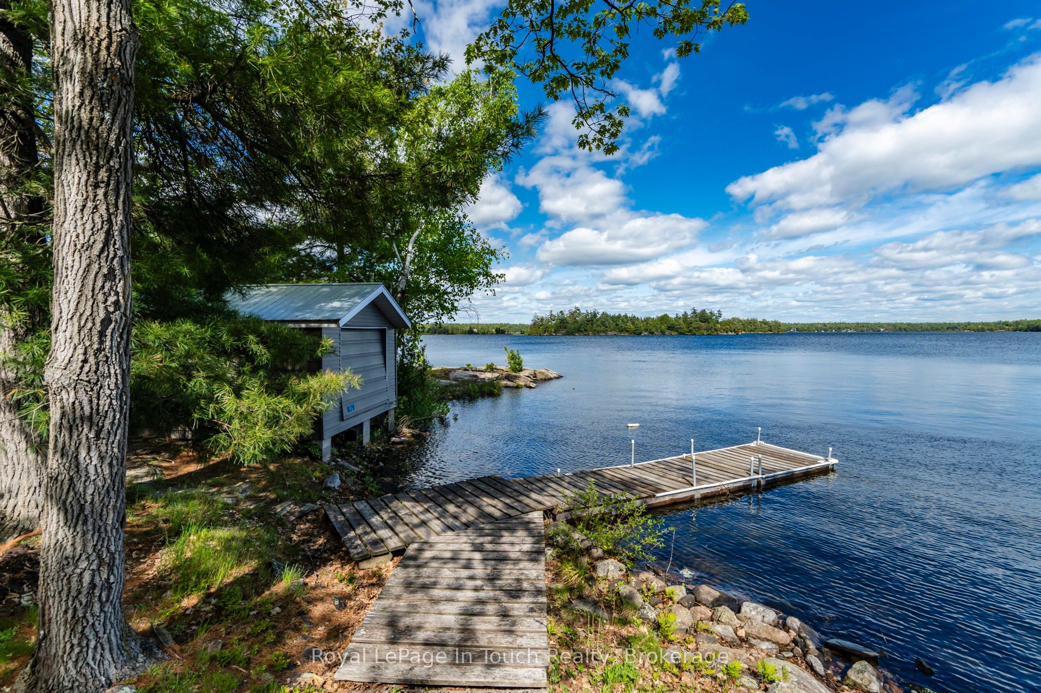 1916 Six Mile Lake Shore Island Property Photo 1