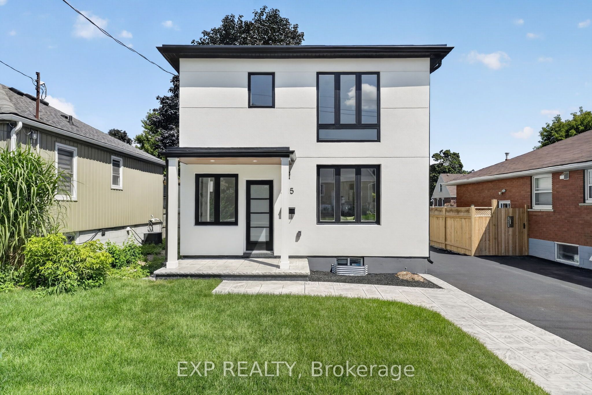 325 Queensdale Avenue E Property Photo 1