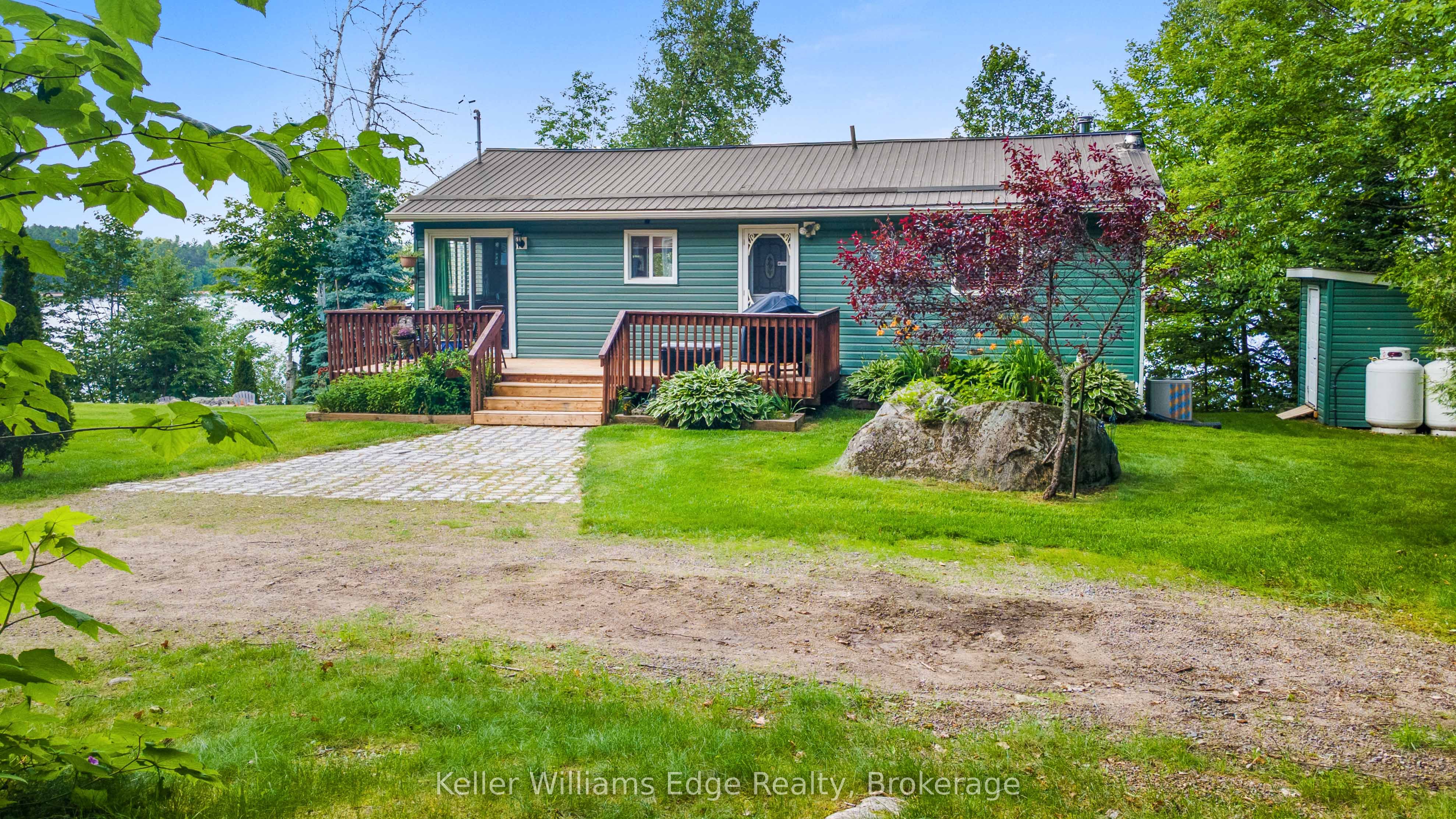 1128 Kamaniskeg Lake Road Property Photo 1