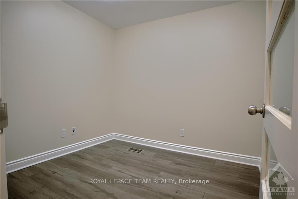 #4 - 1439 Woodroffe Avenue Property Photo 5