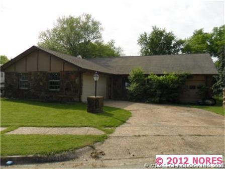 12012 E 33rd Place Property Photo 1
