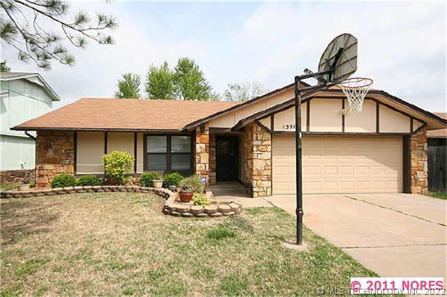 13911 E 33rd Place Property Photo 1