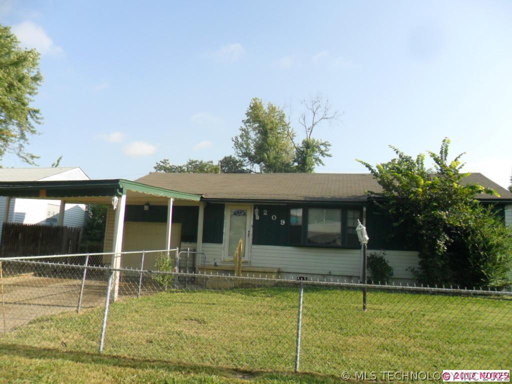 209 E 52nd Place North Property Photo 1