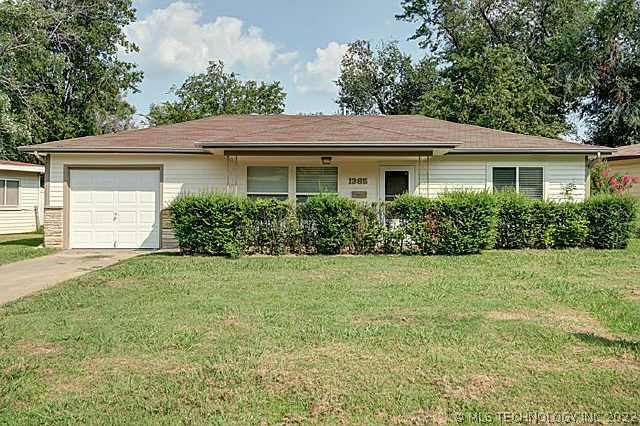 1365 N 76th East Avenue Property Photo 1