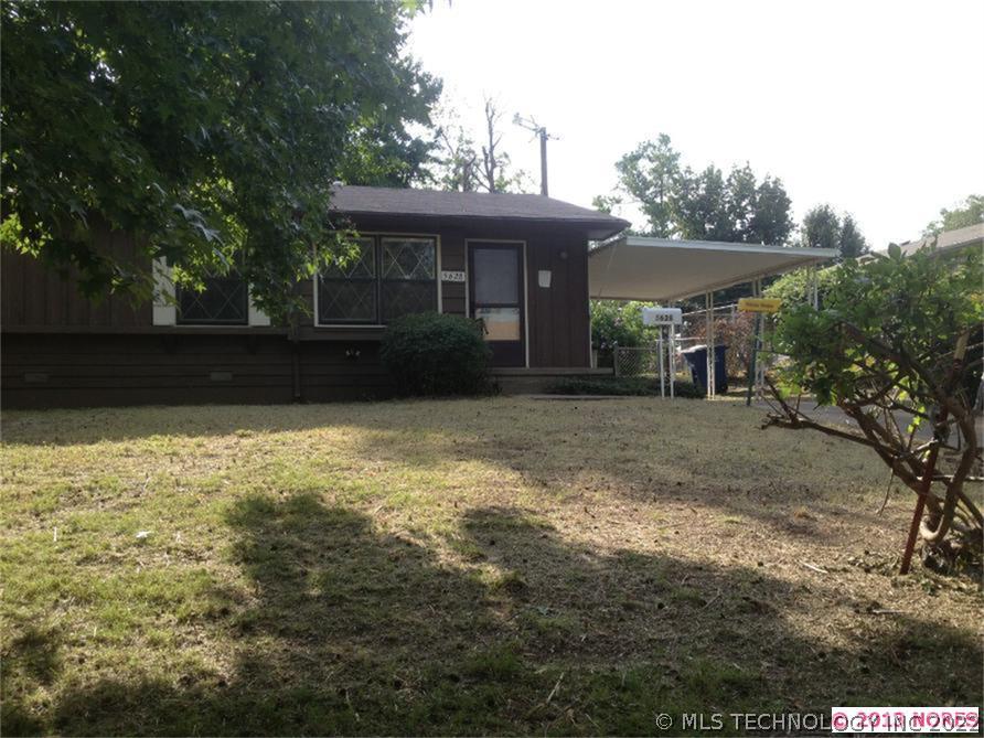 5628 N Garrison Place Property Photo 1