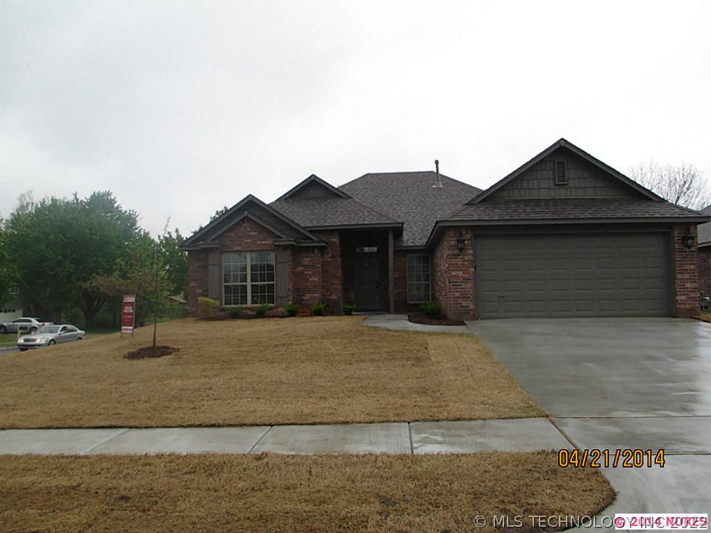 8338 N 119th East Avenue Property Photo 1