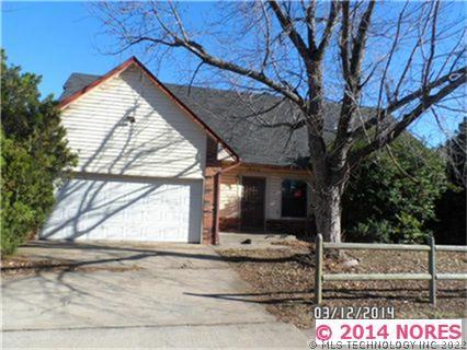 12513 E 28th Place Property Photo 1