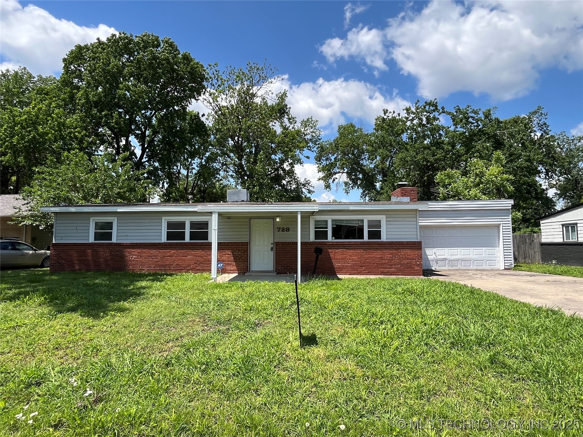 728 S 91st East Avenue Property Photo 1