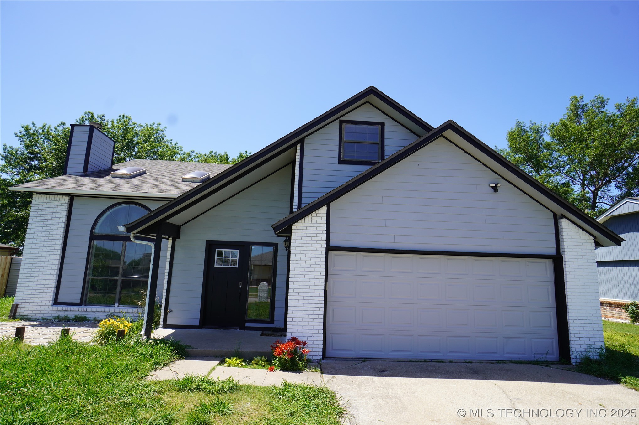 8304 N 124th East Avenue Property Photo 1