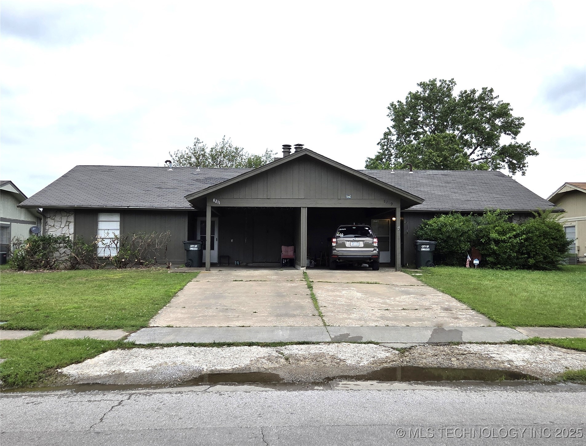 8209 N 117th East Avenue Property Photo 1