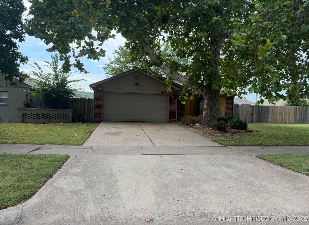 6128 S Madison Place Property Photo 1