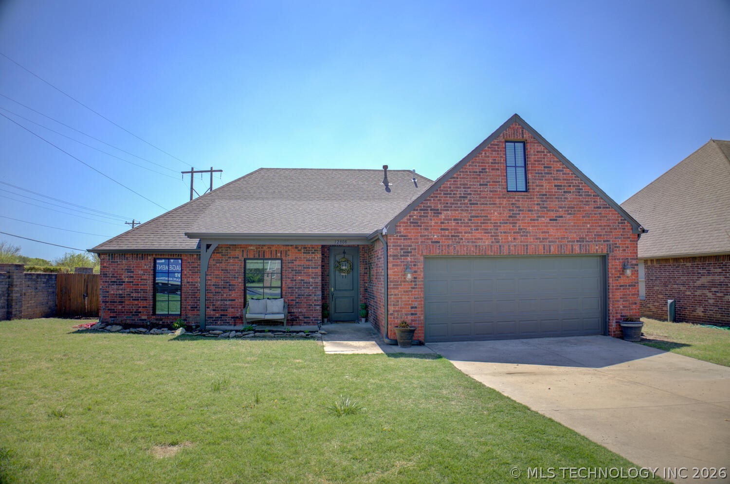 12808 E 69th Street North Property Photo 1