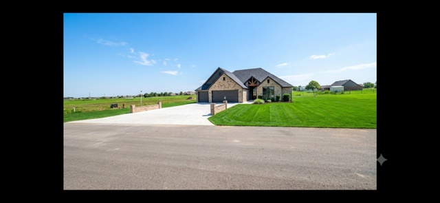 13645 N 58th East Avenue Property Photo 1