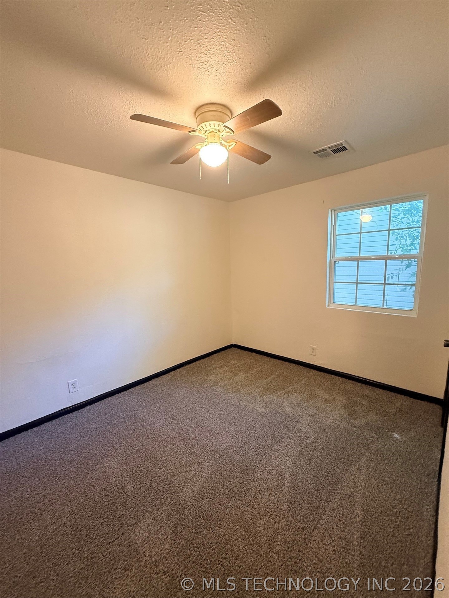 4907 N Garrison Place Property Photo 6