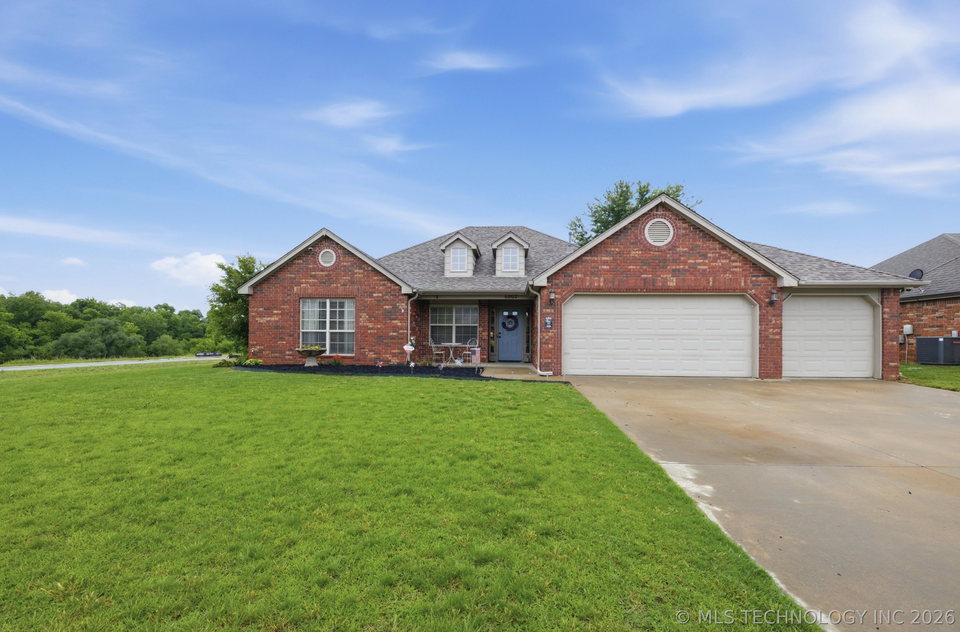 6802 N 128th Court E Property Photo 1