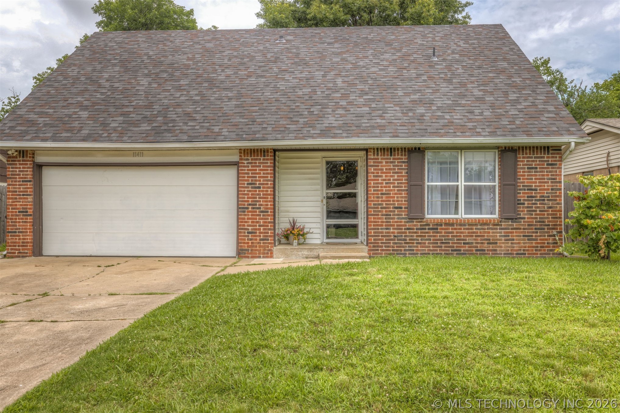 11411 E 37th Place Property Photo 2