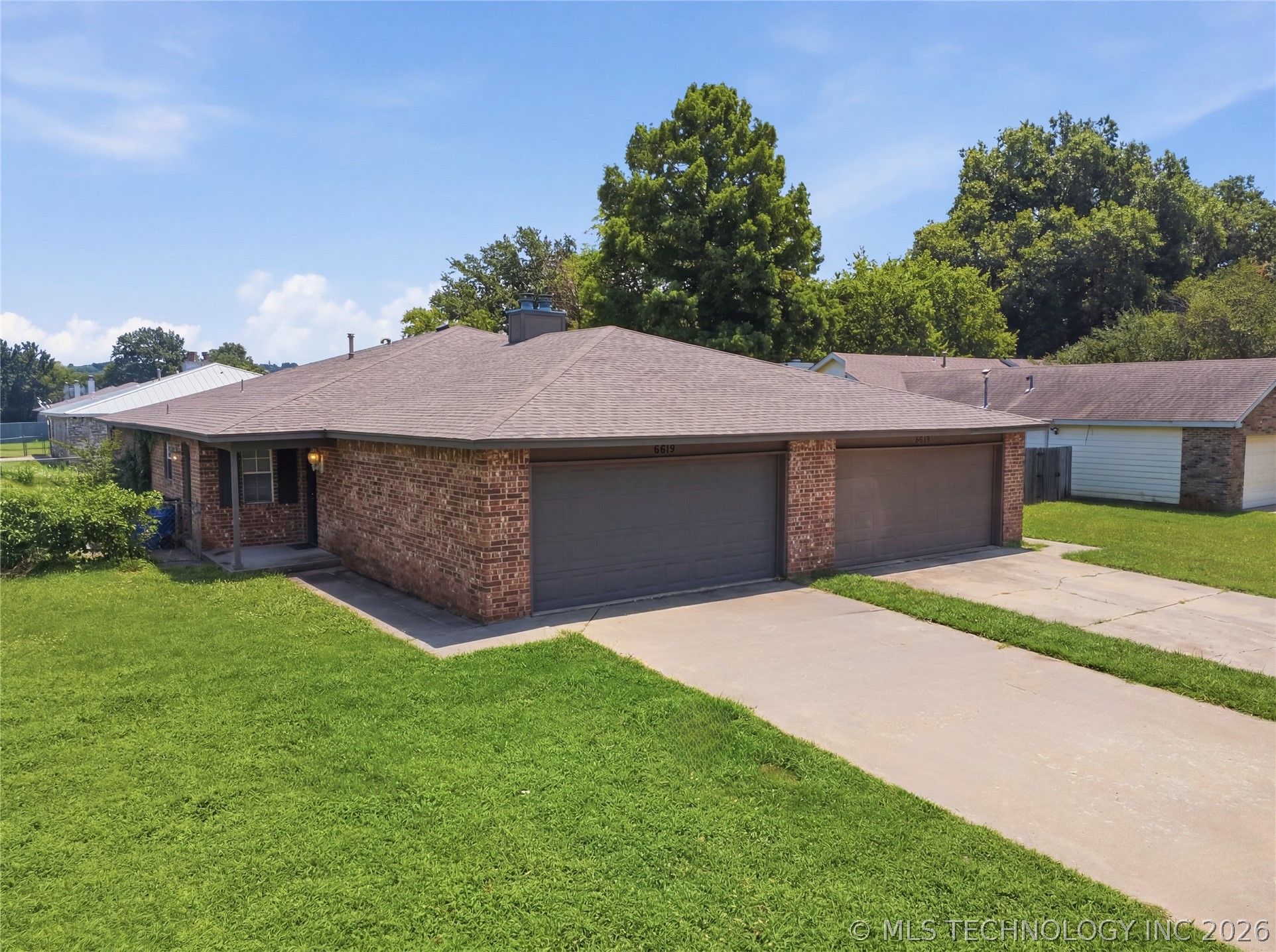 6619 S Utica Place Property Photo 1