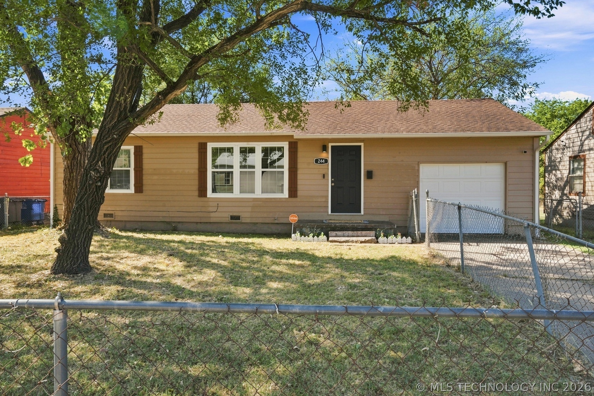 244 E 52nd Place N Property Photo 1