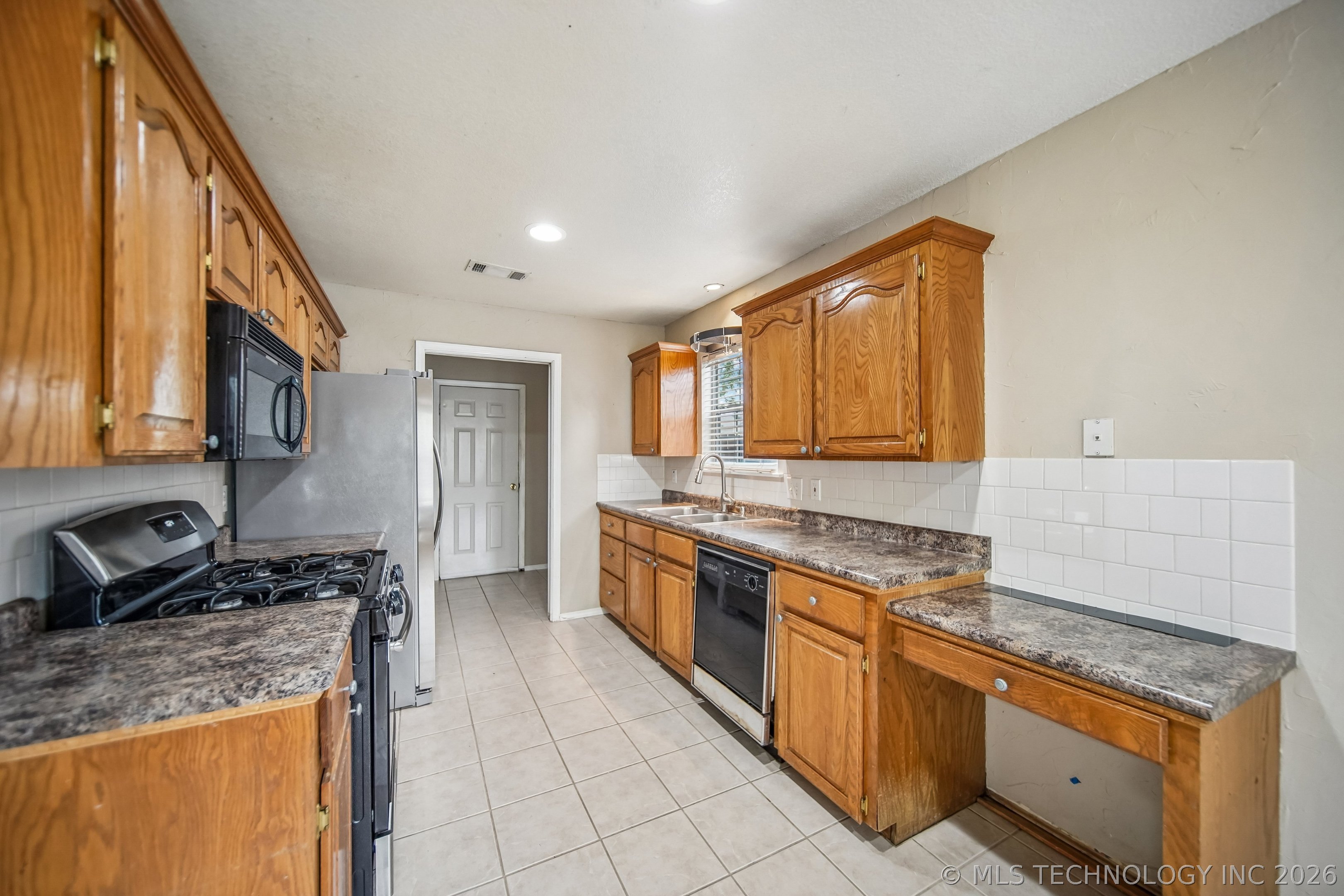 8237 N 127th East Avenue Property Photo 6