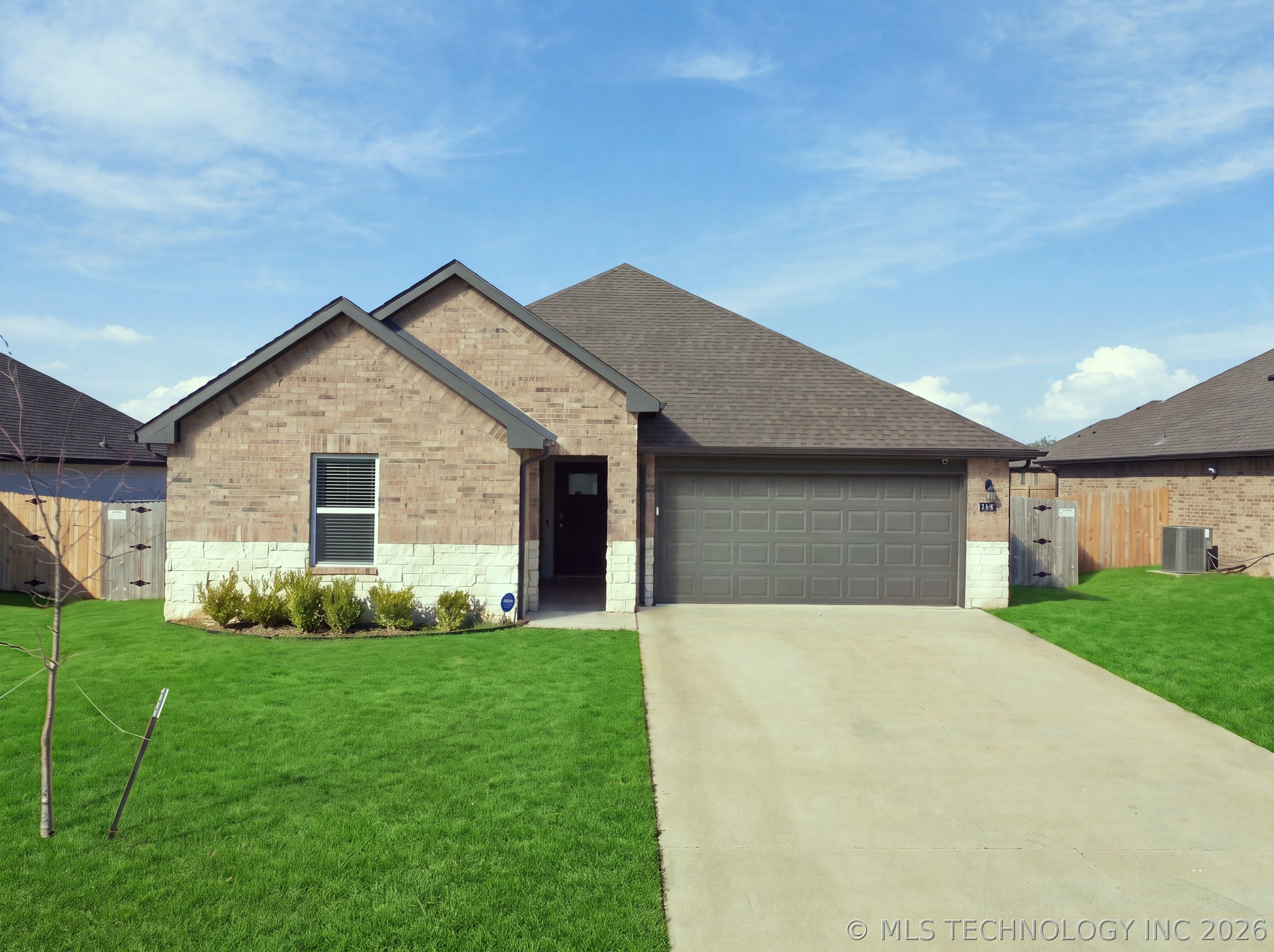 7412 N 155th East Avenue Property Photo 1
