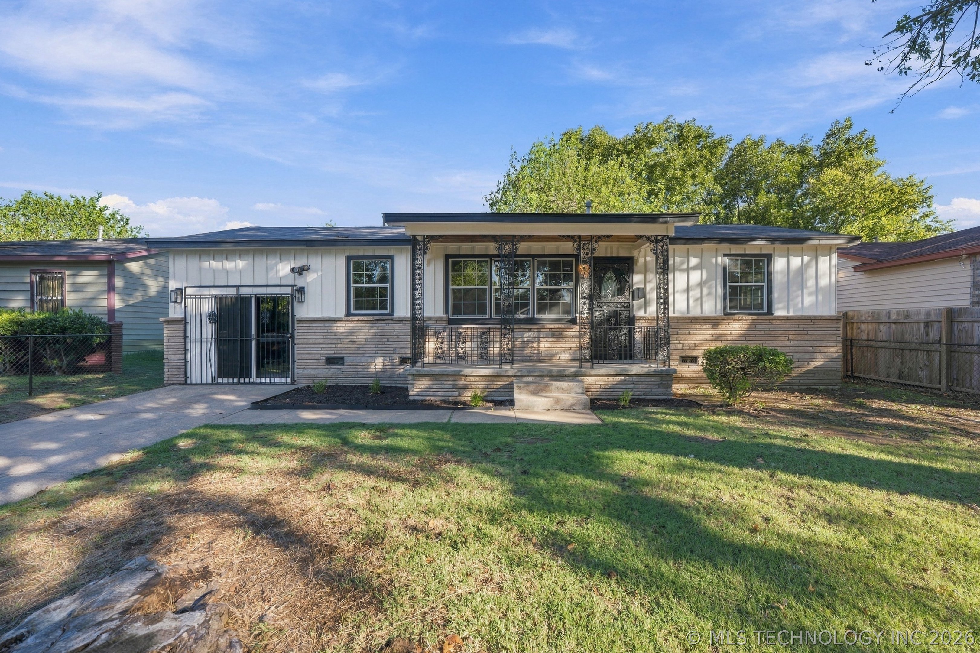 819 E 51st Place N Property Photo 1