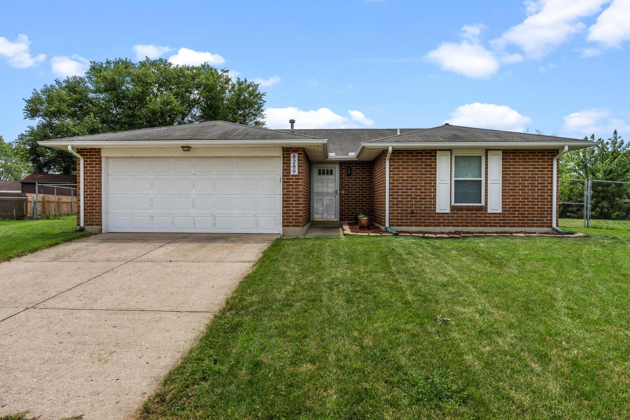 8289 Millspring Place Property Photo 1